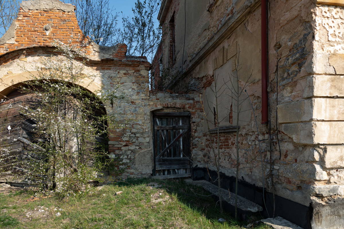 Side of house connected to arch