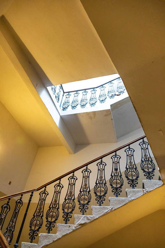 Inside stairs with original railing
