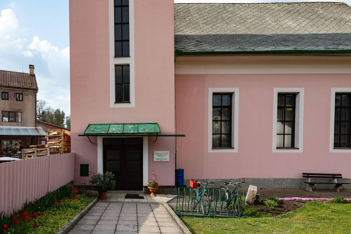 Synagogue is now a Hussite church, during WWII used for grain storage, tower is an addition